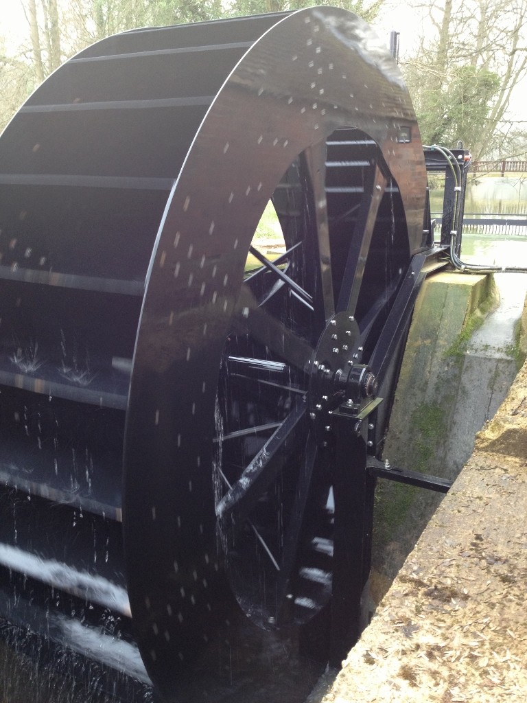 Waterwheel instalied and generating electricity